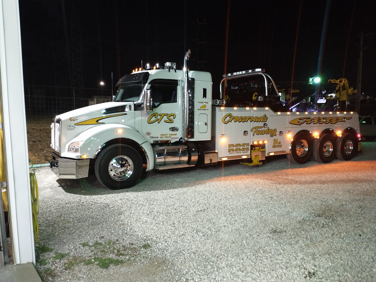 white crossroads tow truck