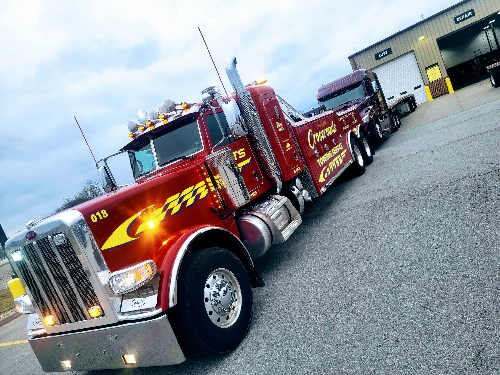 truck hauling semi flatbed truck