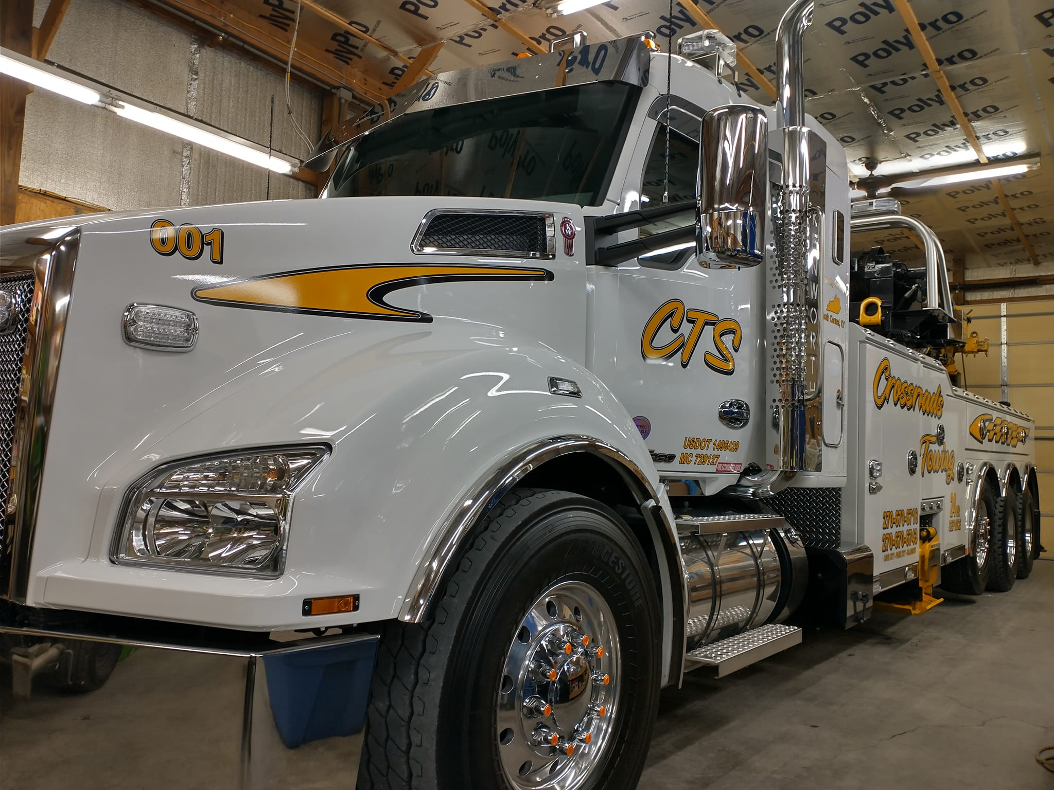 crane truck in garage