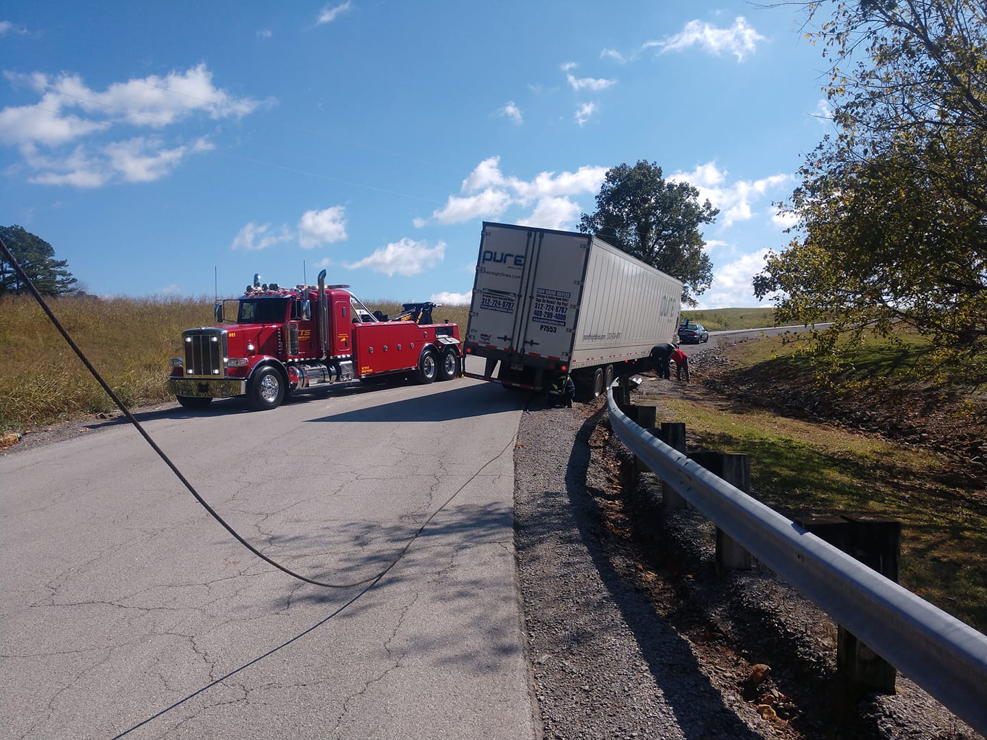 towing semi truck out of ditch